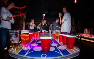 What happens when a cup bounces out in beer pong?